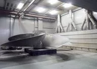 Workbooths are also suitable for large components. The dusts produced when cleaning a ship's propeller are extracted by a panel of fans to a trio of filters.