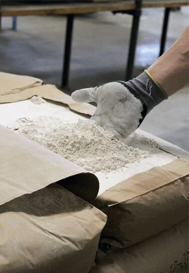 Commercial limestone is used for bonding with the paint overspray deposited on the filter surface. The consumption is minimal compared to other systems.
