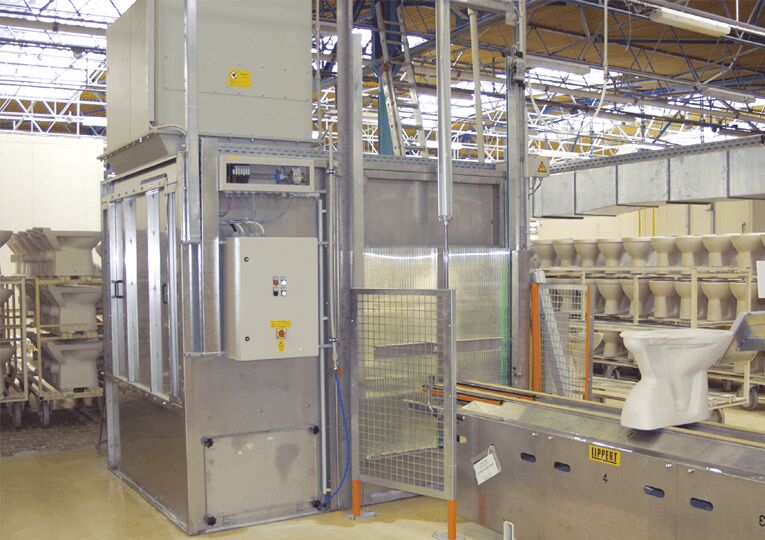 Dust extraction in an enamel coating booth.